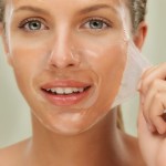 Removing the Mask/ being vulnerable:  a lady lifting off a facial mask